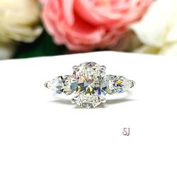 Oval Pear Near Colorless Cubic Zirconia Three Stone Engagement Ring