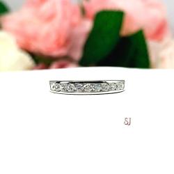 Round 2mm Cubic Zirconia Channel Set Wedding Band