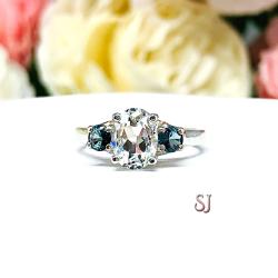 White Topaz 8x6mm Oval with Round London Blue Topaz Ring