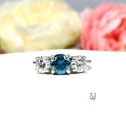 Round London Blue Moissanite Three Stone Sterling Silver Ring
