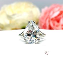Pear Near Colorless Cubic Zirconia Split Shank Engagement Ring