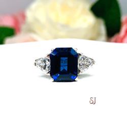 Lab Blue Sapphire Emerald Cut Trillion CZ Accents Ring