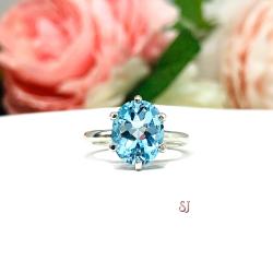 Oval-Cut Sky Blue Topaz Solitaire Ring • 10x8mm, Sterling Silver, Size 4.75