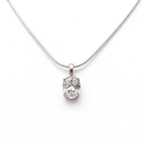 Sterling silver necklace featuring an oval near-colorless cubic zirconia pendant in a four-prong setting with single bail, shown on a sterling silver chain.
