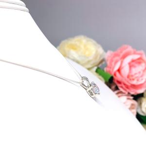 Sterling silver necklace with round-cut near colorless cubic zirconia pendant in a 4-prong basket setting, available in seven sizes.