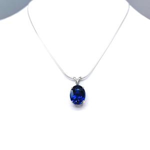 Sterling silver necklace featuring an oval lab-created blue sapphire pendant in a 4-prong setting, available in six sizes.