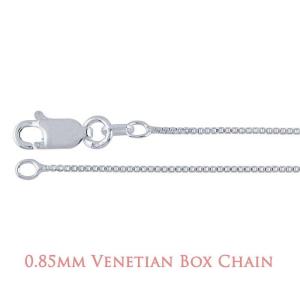 A close-up image of a sterling silver chain with a lobster clasp closure. The chain features a Venetian box design, composed of small, square-shaped links that fit tightly together in a smooth, uniform pattern. The metal surface is polished and reflective, giving the chain a sleek, modern appearance.  At the bottom of the image, text reads “0.85mm Venetian Box Chain” in a soft rose-colored font.