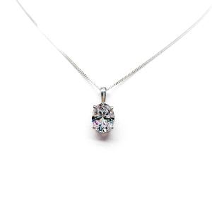 Sterling silver necklace featuring an oval cubic zirconia pendant in a four-prong setting with single bail, shown on a sterling silver chain.
