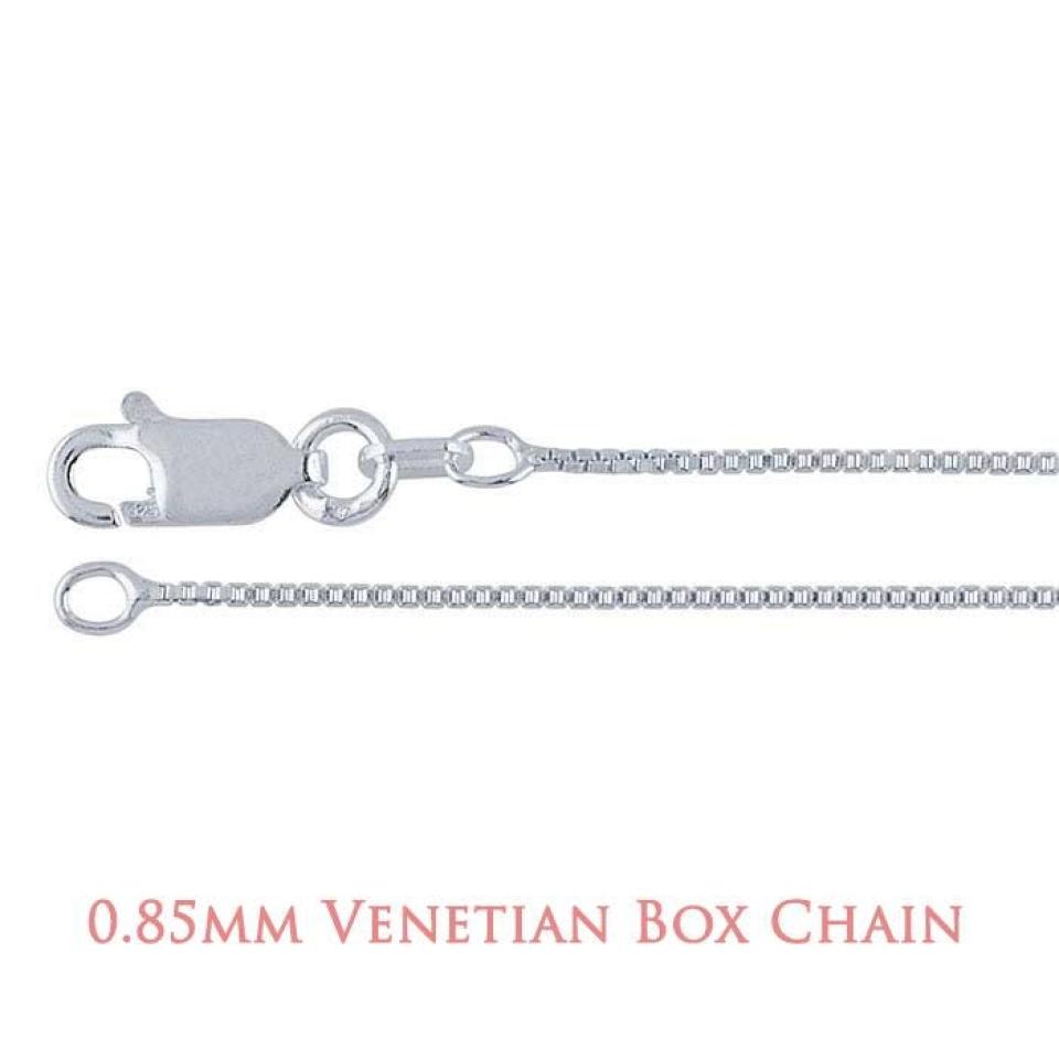 A close-up image of a sterling silver chain with a lobster clasp closure. The chain features a Venetian box design, composed of small, square-shaped links that fit tightly together in a smooth, uniform pattern. The metal surface is polished and reflective, giving the chain a sleek, modern appearance.  At the bottom of the image, text reads “0.85mm Venetian Box Chain” in a soft rose-colored font.