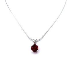 Sterling silver necklace featuring a round lab-created ruby pendant in a four-prong setting, shown in one of four available sizes on a sterling silver chain.