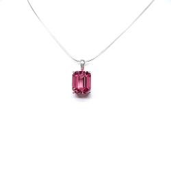 Sterling silver necklace featuring a 12x10mm emerald-cut Padparadscha pink sapphire pendant. The lab-created gemstone glows with a soft salmon pink hue, set in a sleek prong setting and suspended from a delicate silver chain.